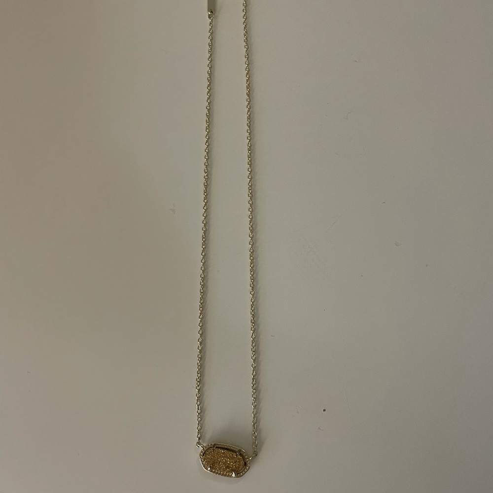 Kendra Scott Elisa Necklace. Gold chain & brass/orange sparkly pendant